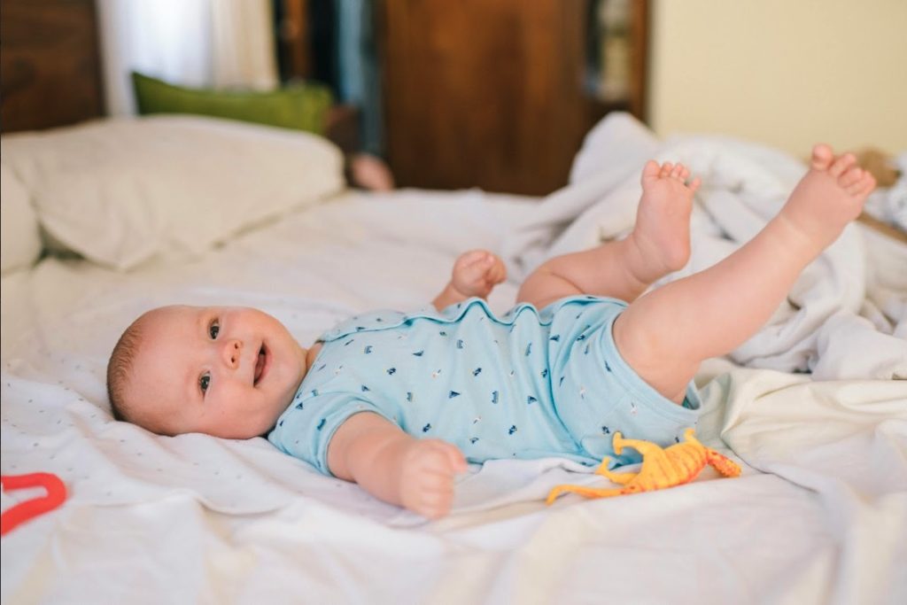 Happy Baby in a Stylish Onesie